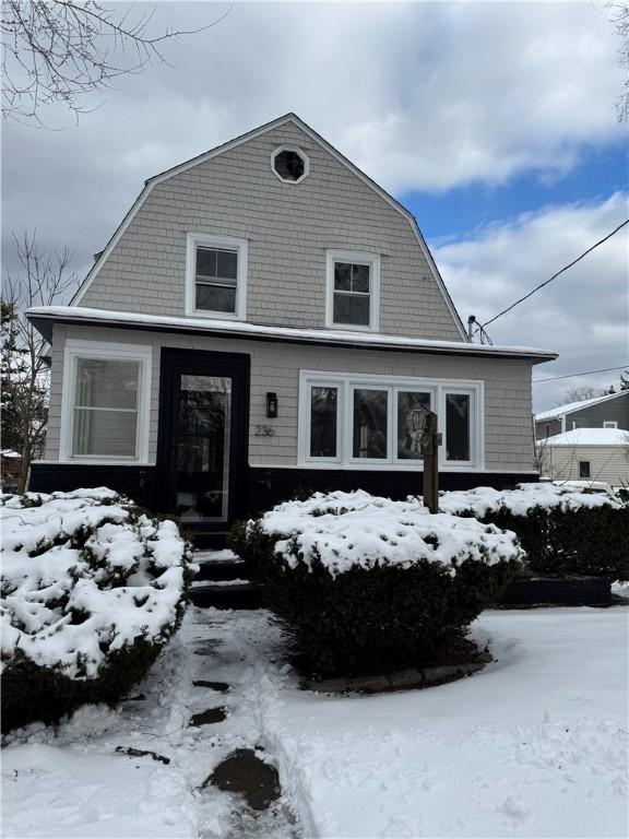 dutch colonial featuring a gambrel roof