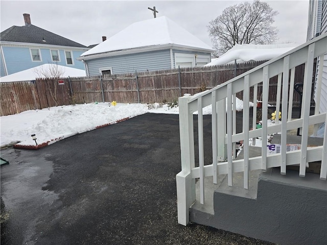 view of yard layered in snow