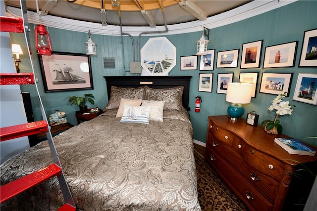 bedroom featuring ornamental molding and coffered ceiling