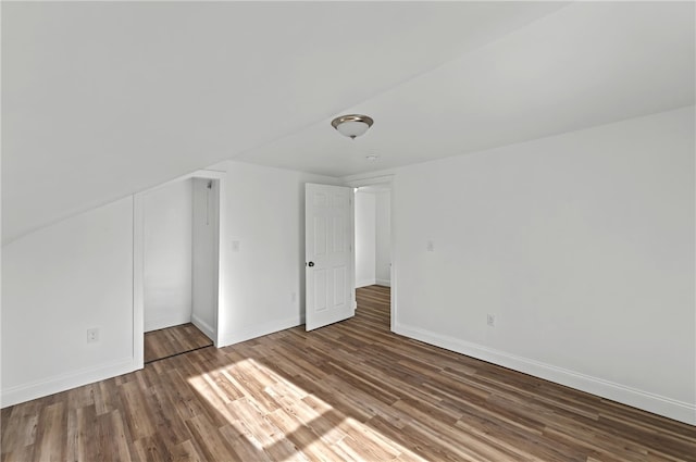 unfurnished bedroom featuring dark wood-type flooring