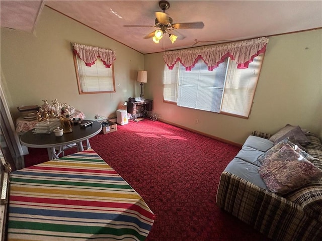 interior space with vaulted ceiling and ceiling fan