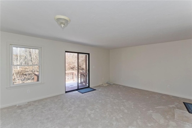 view of carpeted spare room