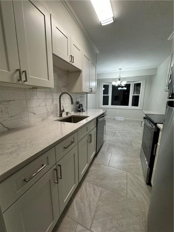 kitchen featuring tasteful backsplash, dishwashing machine, an inviting chandelier, a sink, and range with electric stovetop