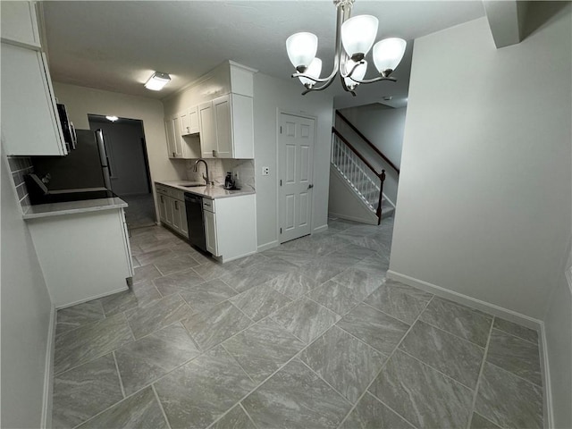 kitchen with a sink, white cabinetry, black dishwasher, light countertops, and tasteful backsplash