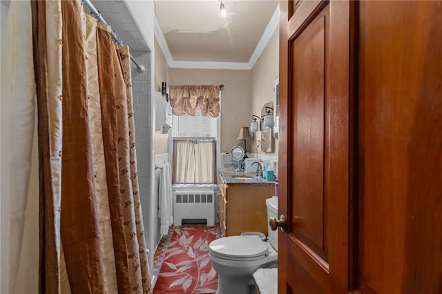 full bath featuring curtained shower, toilet, vanity, radiator heating unit, and crown molding