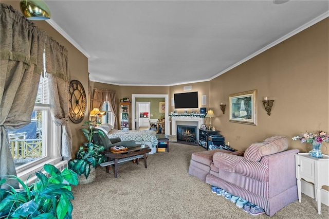 carpeted living area featuring a warm lit fireplace and crown molding