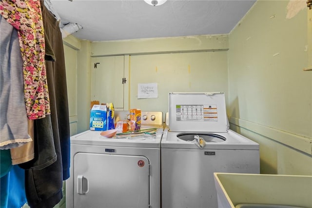 laundry area featuring laundry area and washer and dryer