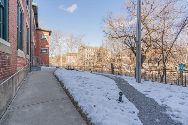 view of yard covered in snow