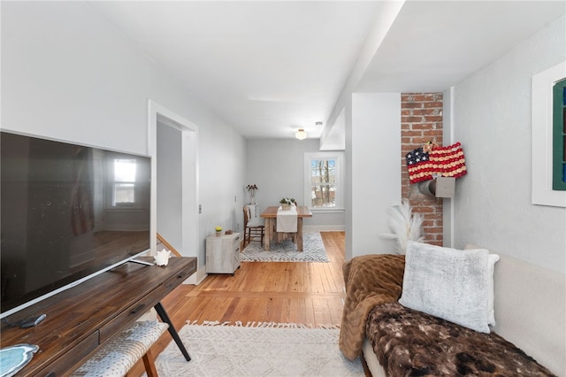 living area with wood finished floors