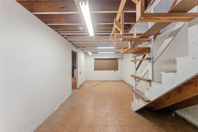 basement featuring light parquet floors