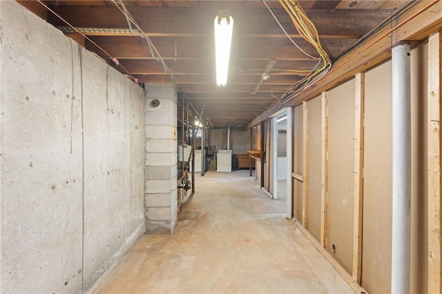 basement with washing machine and clothes dryer