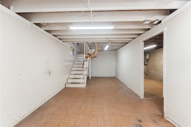 basement with light parquet flooring