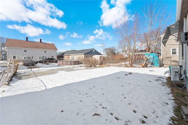 view of yard covered in snow