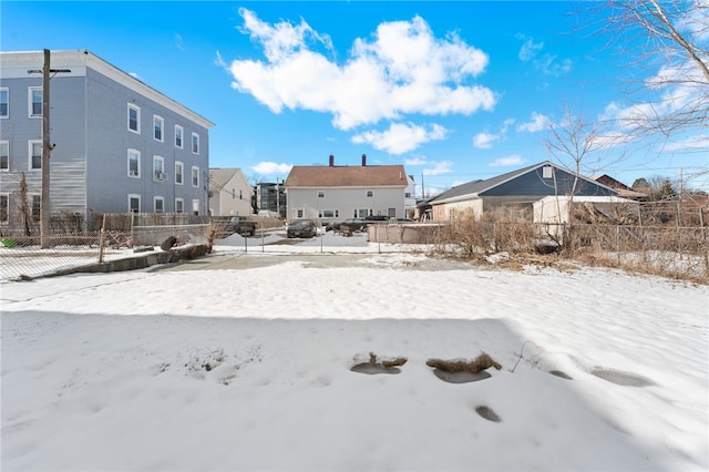 view of yard covered in snow