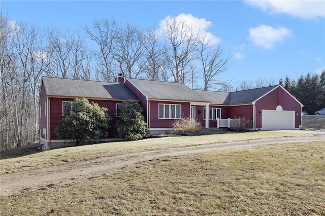 single story home featuring dirt driveway, a chimney, a front yard, and a garage