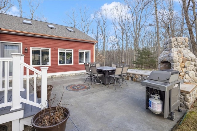 view of patio / terrace featuring area for grilling and outdoor dining space