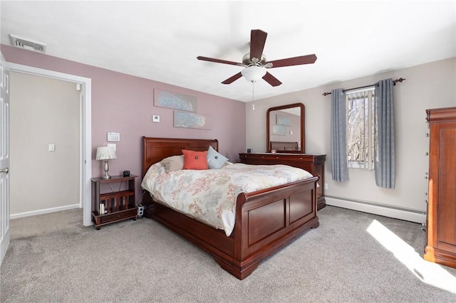 bedroom with baseboards, visible vents, a ceiling fan, light colored carpet, and baseboard heating