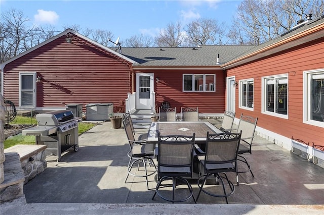 view of patio with entry steps and grilling area