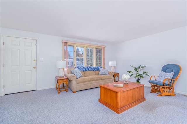 living room featuring light colored carpet