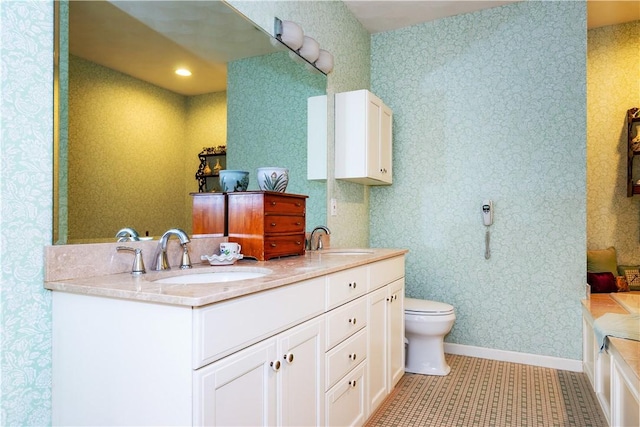 bathroom with tile patterned floors, toilet, and vanity