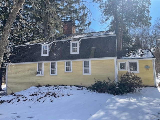 view of snow covered property