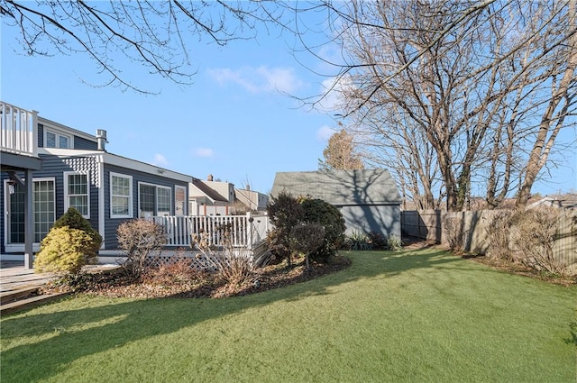 view of yard with a deck