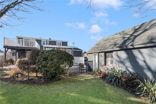 view of yard featuring a deck