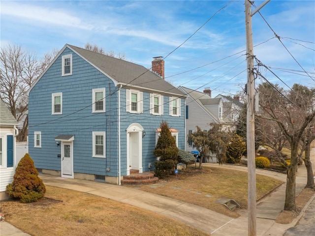 colonial house with a front lawn