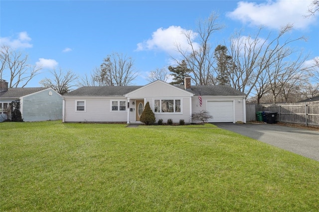 single story home featuring a front lawn and a garage