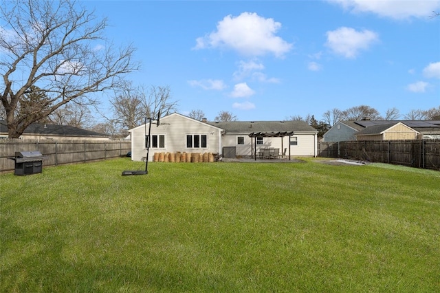 back of property with a yard and a pergola