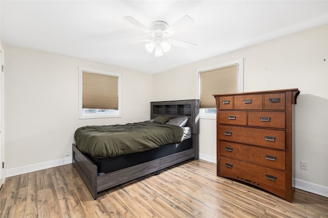 bedroom featuring ceiling fan and light hardwood / wood-style floors