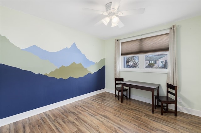 interior space featuring ceiling fan and wood-type flooring