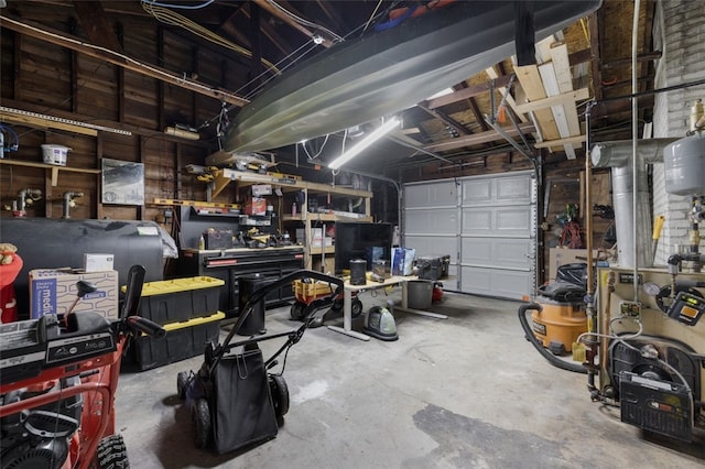 garage with a workshop area