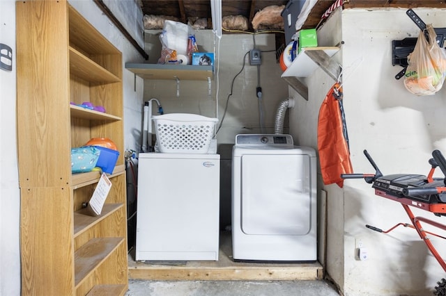 laundry room with washer and clothes dryer