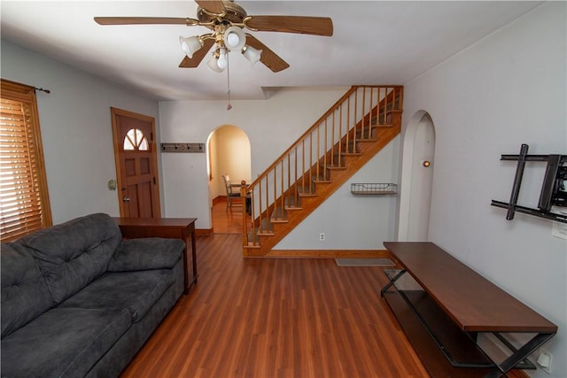 living room with ceiling fan, hardwood / wood-style flooring, and a wealth of natural light