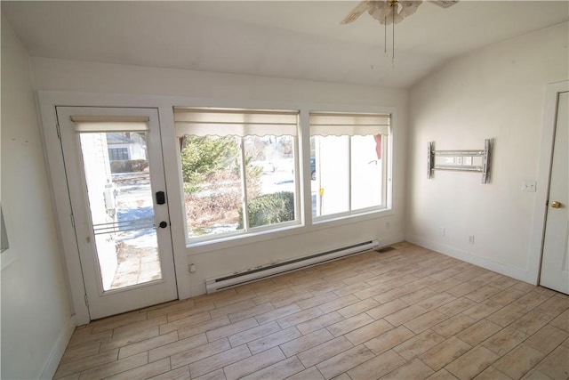 interior space featuring baseboard heating, ceiling fan, light wood-type flooring, and lofted ceiling