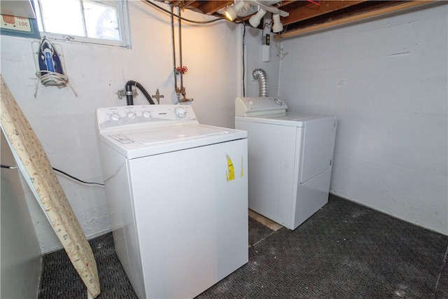 washroom featuring independent washer and dryer