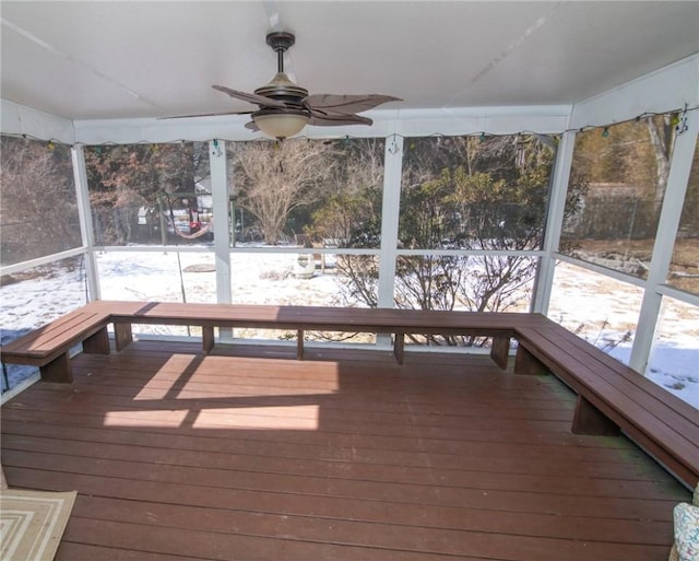 snow covered deck with ceiling fan