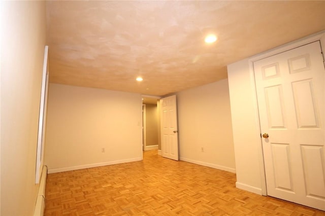 unfurnished room featuring light parquet floors