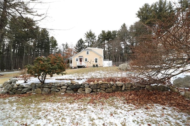 view of yard covered in snow