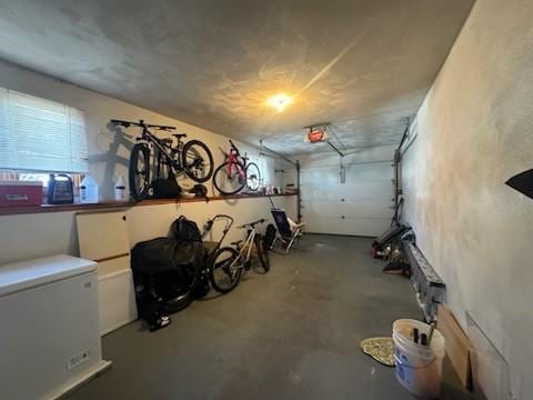 garage with bike storage and refrigerator