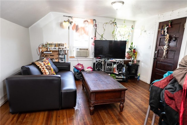 living room with cooling unit, dark hardwood / wood-style floors, and lofted ceiling