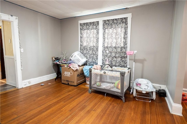 miscellaneous room featuring wood-type flooring