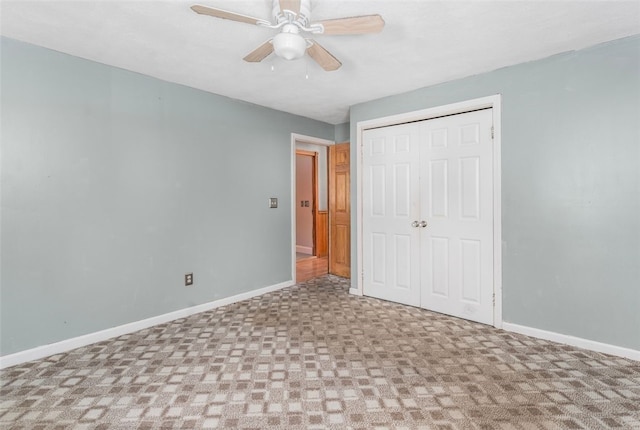 unfurnished bedroom featuring a closet and ceiling fan