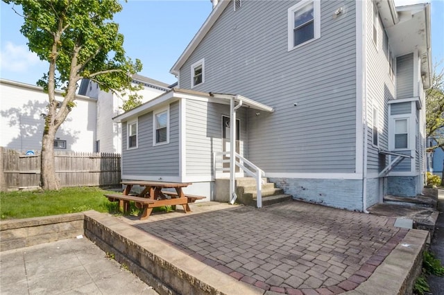 back of property with a patio area