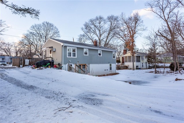 view of snow covered property