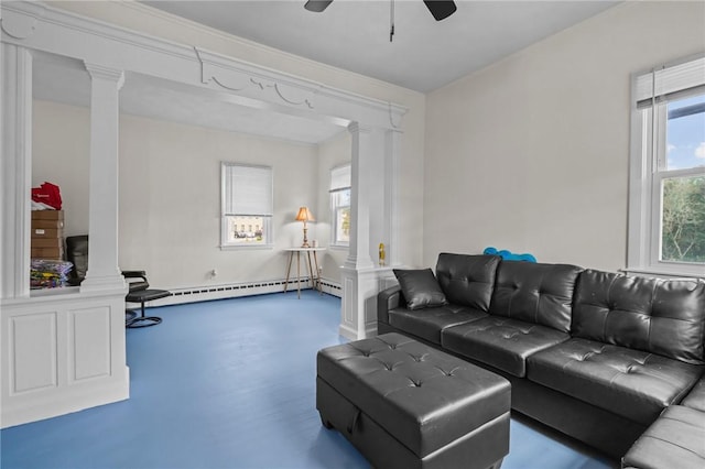 living room featuring ceiling fan, decorative columns, concrete floors, and a baseboard radiator