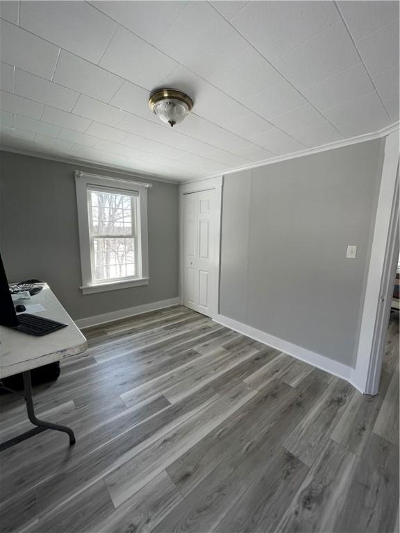 840 S Main St, Burrillville, RI 02859 - unfurnished office featuring wood finished floors, baseboards, and ornamental molding