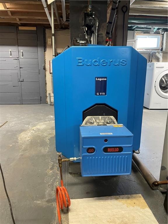 840 S Main St, Burrillville, RI 02859 - utility room with washer / dryer and a heating unit
