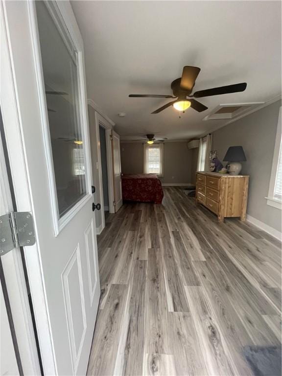 840 S Main St, Burrillville, RI 02859 - unfurnished living room featuring ceiling fan, light wood-style flooring, and baseboards